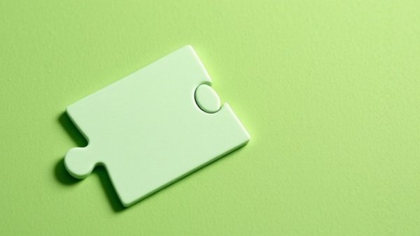 Pastel puzzle piece symbolizing collaboration between Xanadu and ASML.