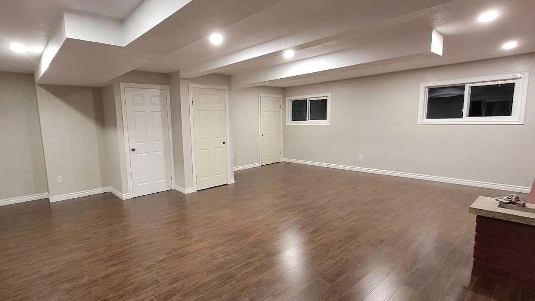 urban home improvement, purposeful, installing new smart home devices, photorealistic, a chic loft apartment with industrial decor, highly detailed, cables and gadgets, mid-range focus, cool grays and blues, LED and natural lighting, shot with a 28mm lens.