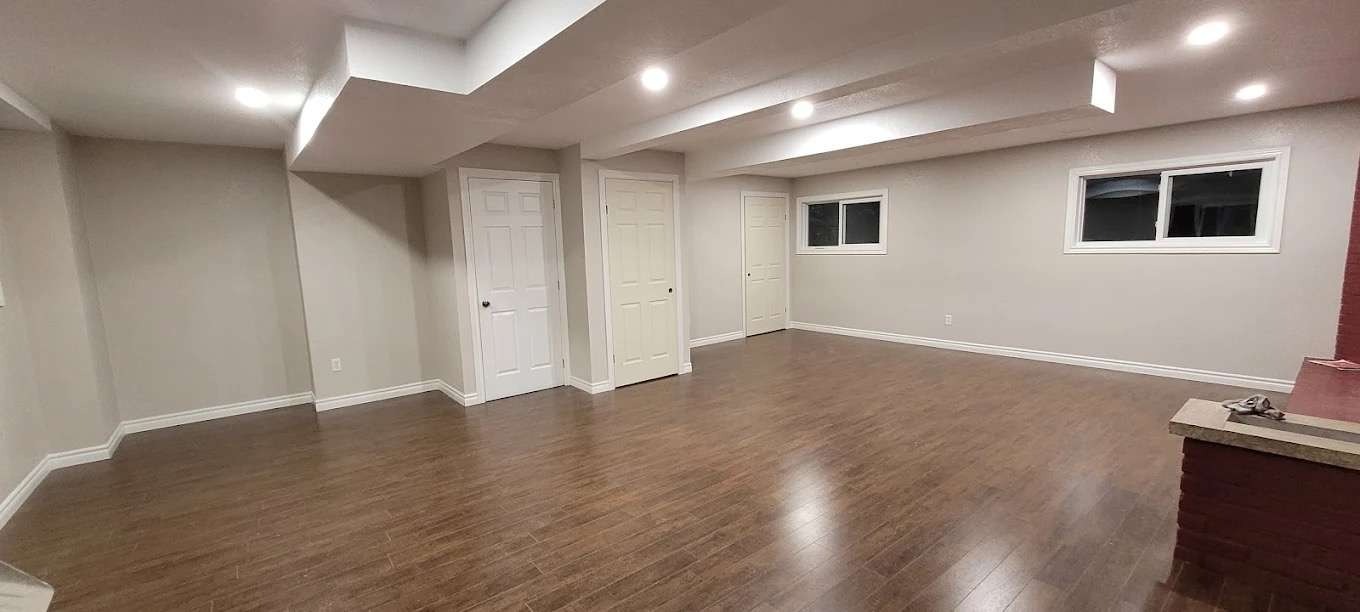 luxury renovation decor, refined, selecting finishes, photorealistic, opulent mansion with marble and gold accents, highly detailed, intricate moldings and silk drapes, focus on elegance, gold and cream, soft ambient lighting, shot with a prime lens