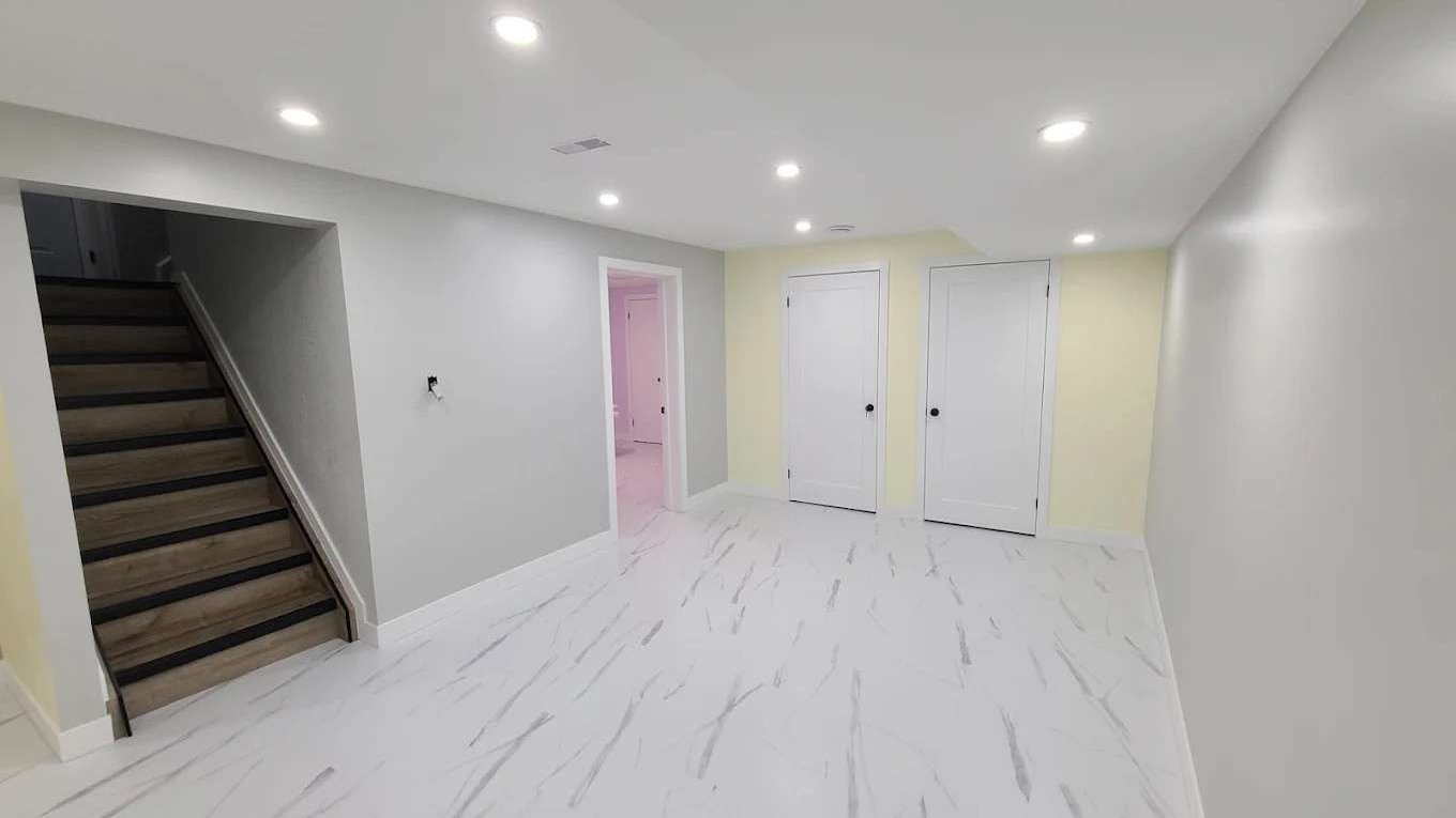 traditional home remodel, proud, restoring crown molding, photorealistic, a grand old manor with lush interiors, highly detailed, intricate plaster patterns and wood trims, high resolution, warm golds and browns, chandelier lighting, shot with a 100mm macro lens.