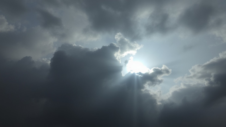 Dramatic cloudy sky with an ominous atmosphere.