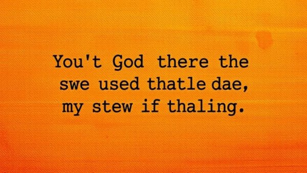 Coaching the uncoachable message on orange fabric background.