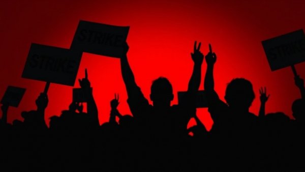 Protest with strike signs on red background, IGMC Shimla Resident Doctors Strike.