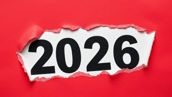 Torn paper revealing the year 2026, suggesting changes in charitable deductions.