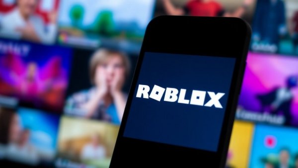 Smartphone showing Roblox logo, blurred background with colors, AI Tools.