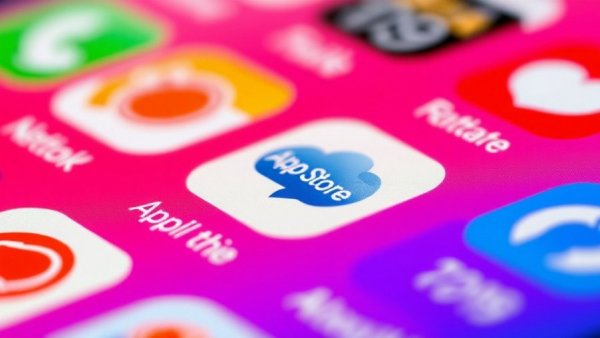 Close-up of mobile app icons with App Store notification, AI tools.