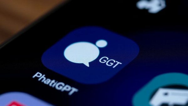 ChatGPT app icon on smartphone screen, dark background.