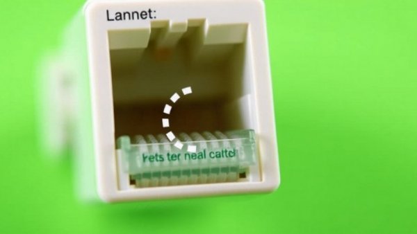 Loading symbol on Ethernet port, representing net neutrality challenge.