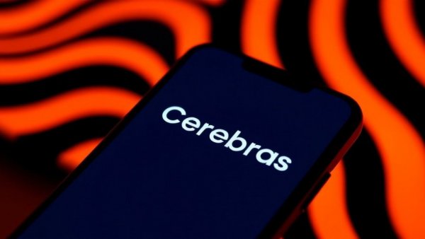 Cerebras logo on phone with wavy orange background