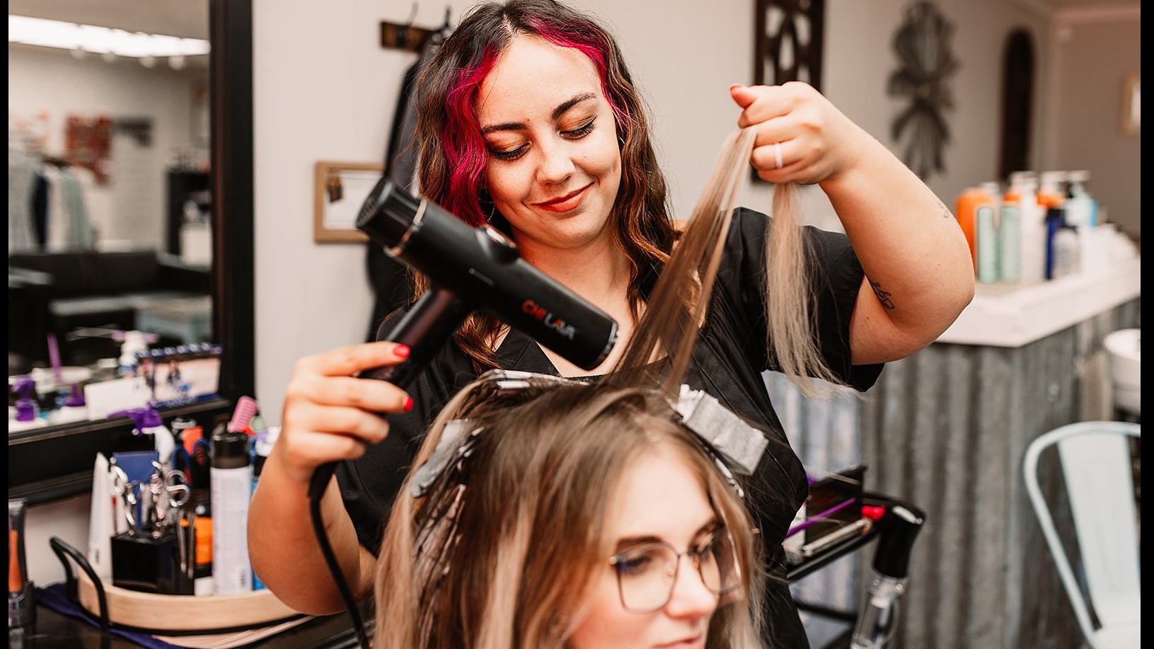 sylist emily alexander with a client