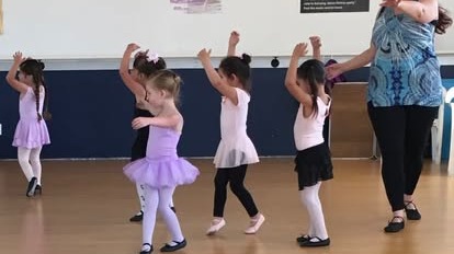 Inclusive dance programs at MCDC, children and adults joyfully dancing together