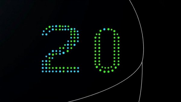 Abstract design celebrating 20 years of WordPress.com with colorful dots.