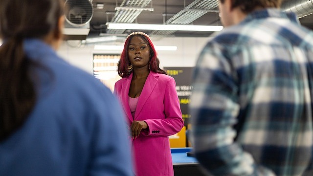 Motivating your team: football players seated on a bench.