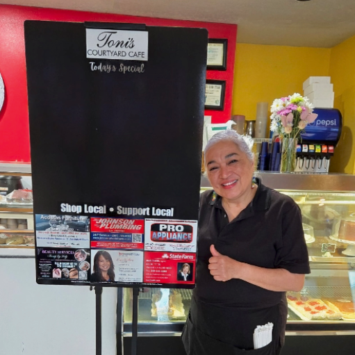 vintage shoplocalcommunity event, nostalgic expressions, exchanging antiques, photorealistic, flea market with vintage items, highly detailed, faded posters flapping, 4k resolution, sepia tones, filtered sunlight, shot with a 85mm vintage lens.