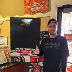 shoplocallove art fair, artistic expressions, creating together, photorealistic, open pavilion with art displays, highly detailed, canvases and brushes scattered, 8k resolution, varied colors, overhead natural light, shot with a wide-angle zoom lens.