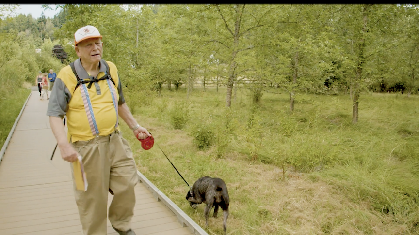 Chuck Burroughs Story, Cinematic storytelling. Chuck Burroughs walking his dog.