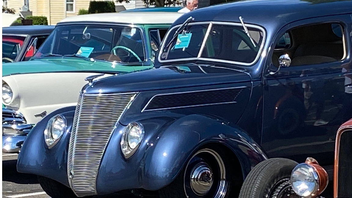 dark blue car at classic car show