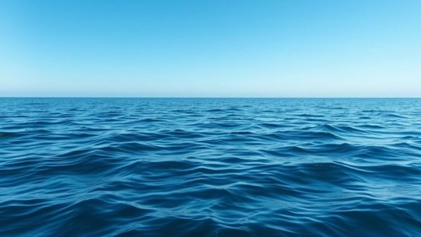 Serene ocean waves under clear sky, depicting wave height.