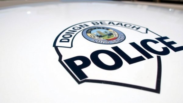 Long Beach police emblem close-up on a car, 15-year-old armed robbery Long Beach