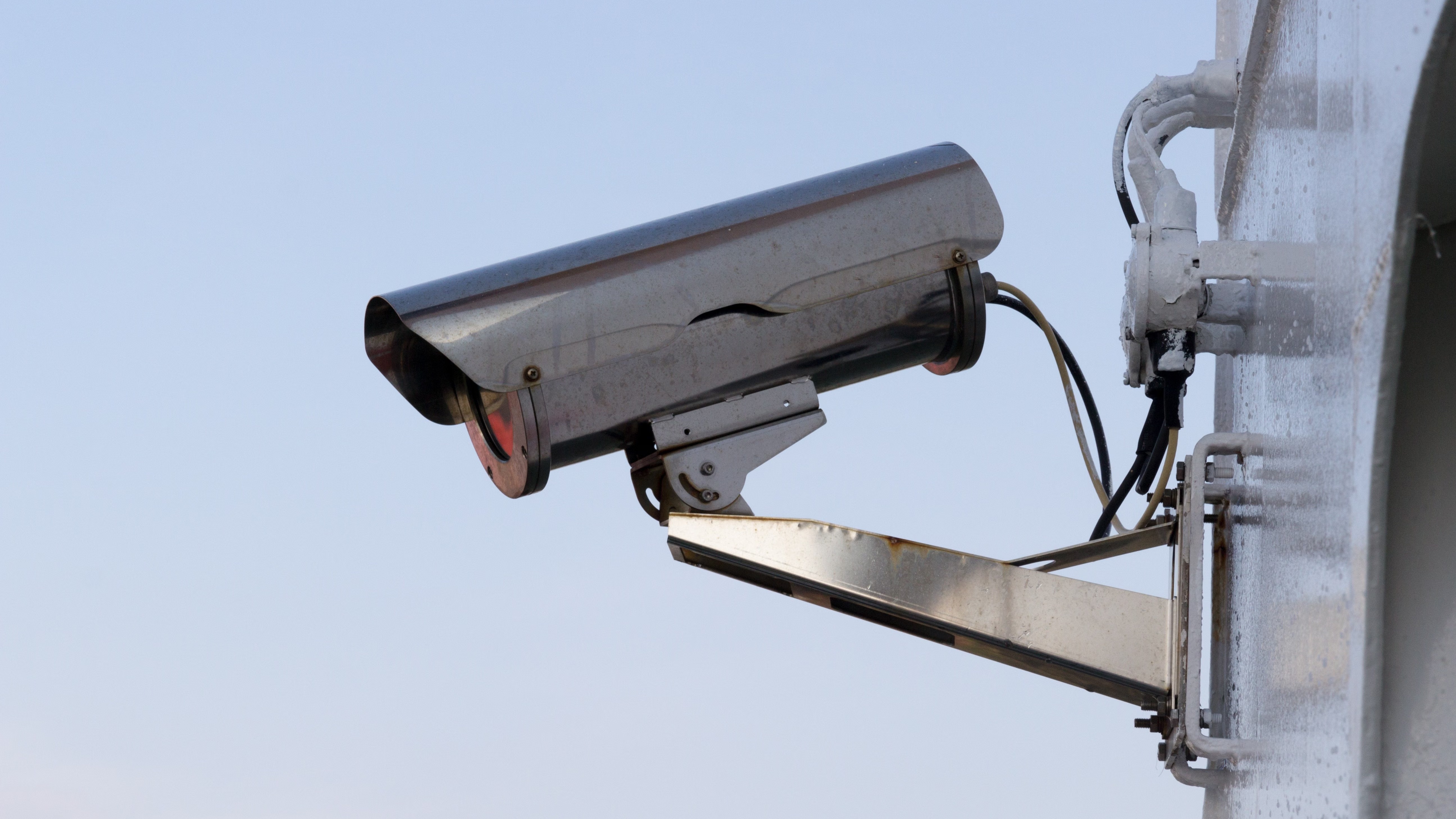 Security camera mounted on an exterior building