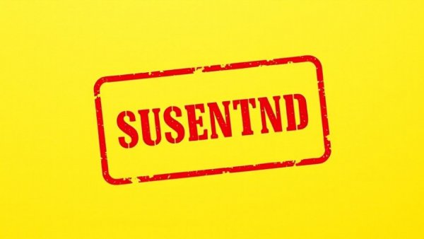 Suspended stamp on yellow background representing Google Ads suspension accuracy.