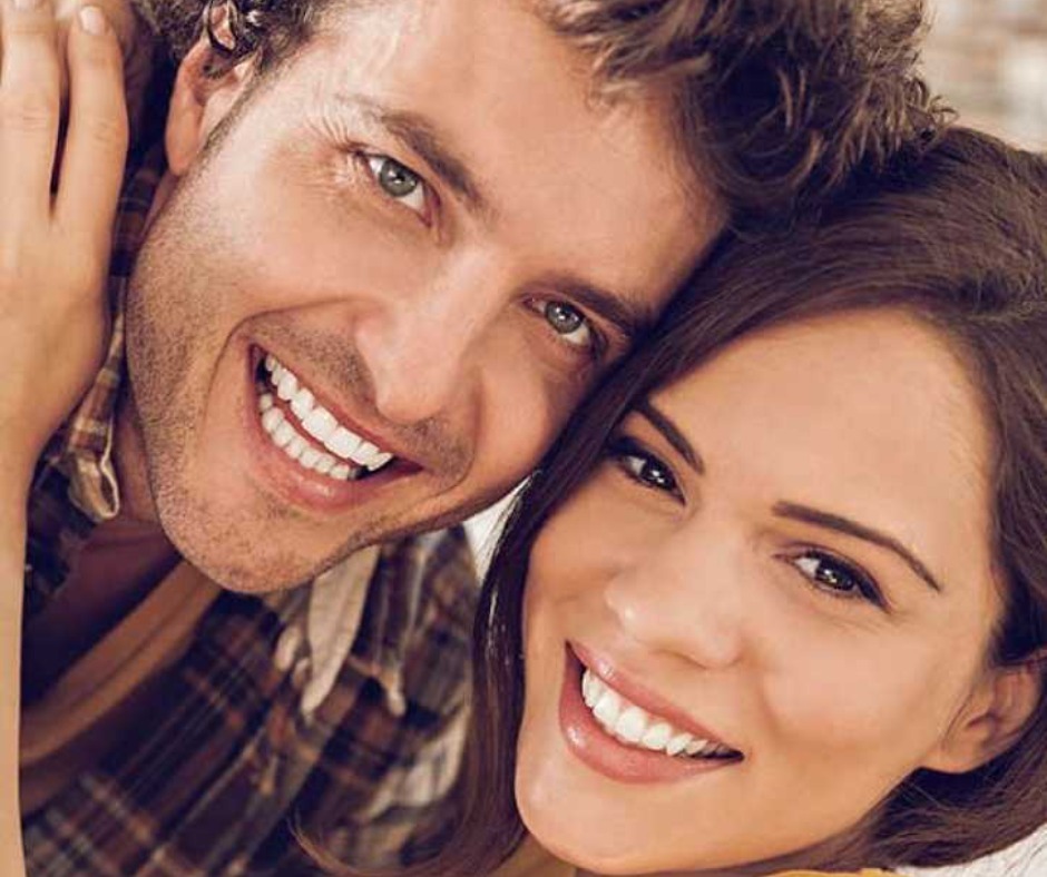 Beautiful couple Smiling Because of mono dental implants