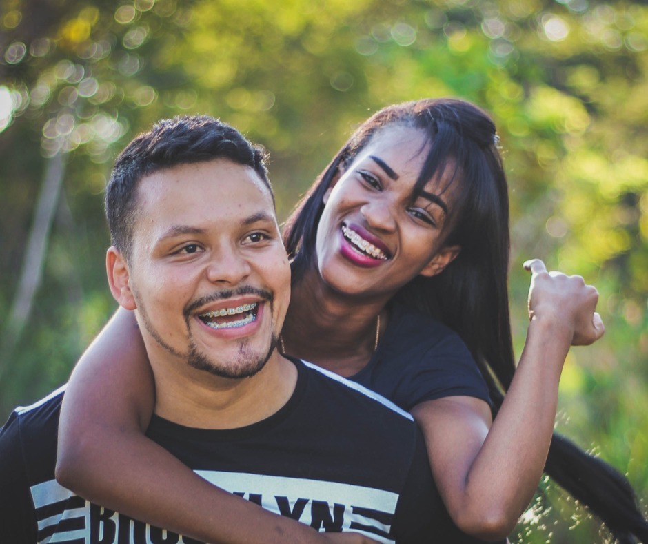 Couple smiling after mono implant procedure