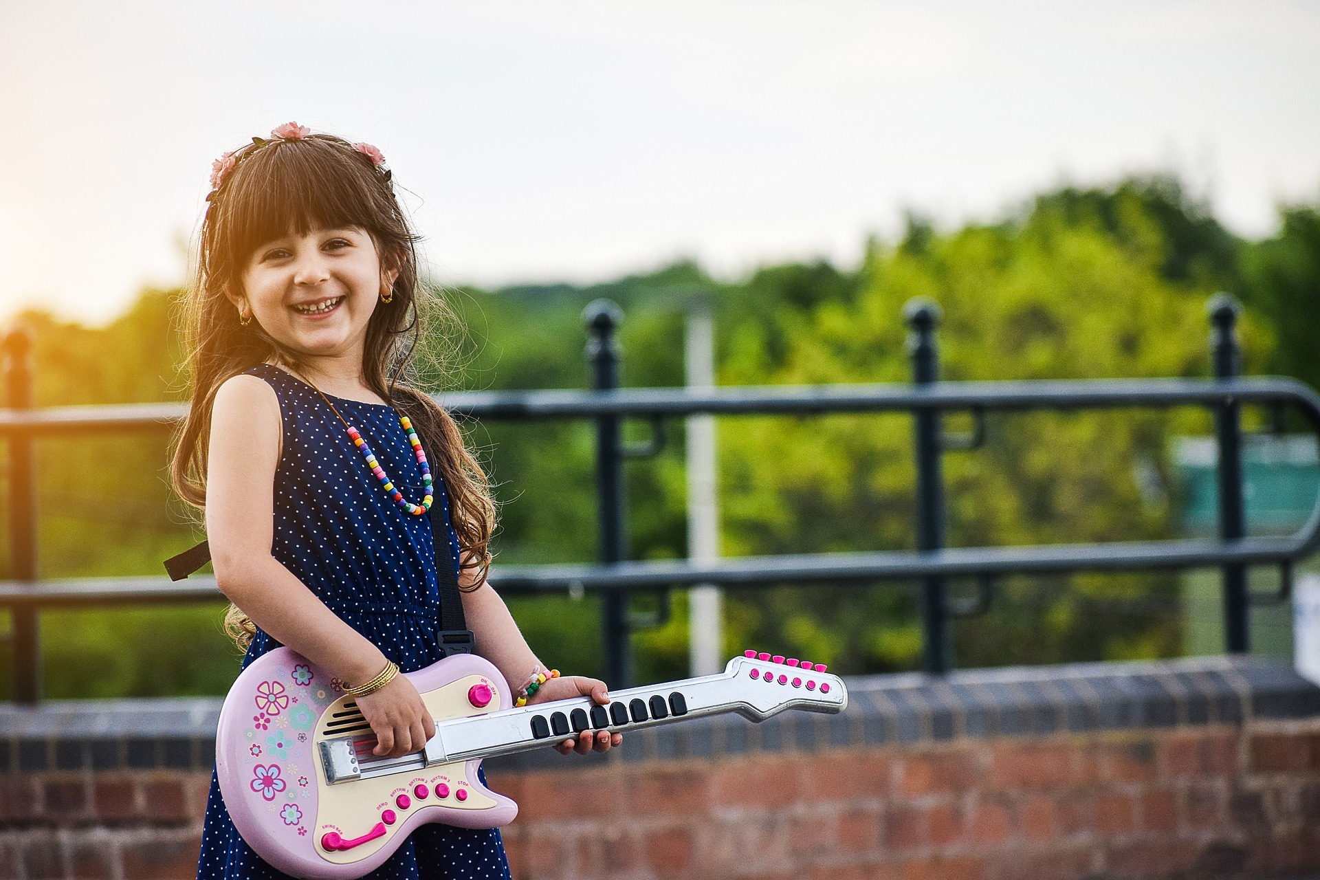 Young girl playing Guitar