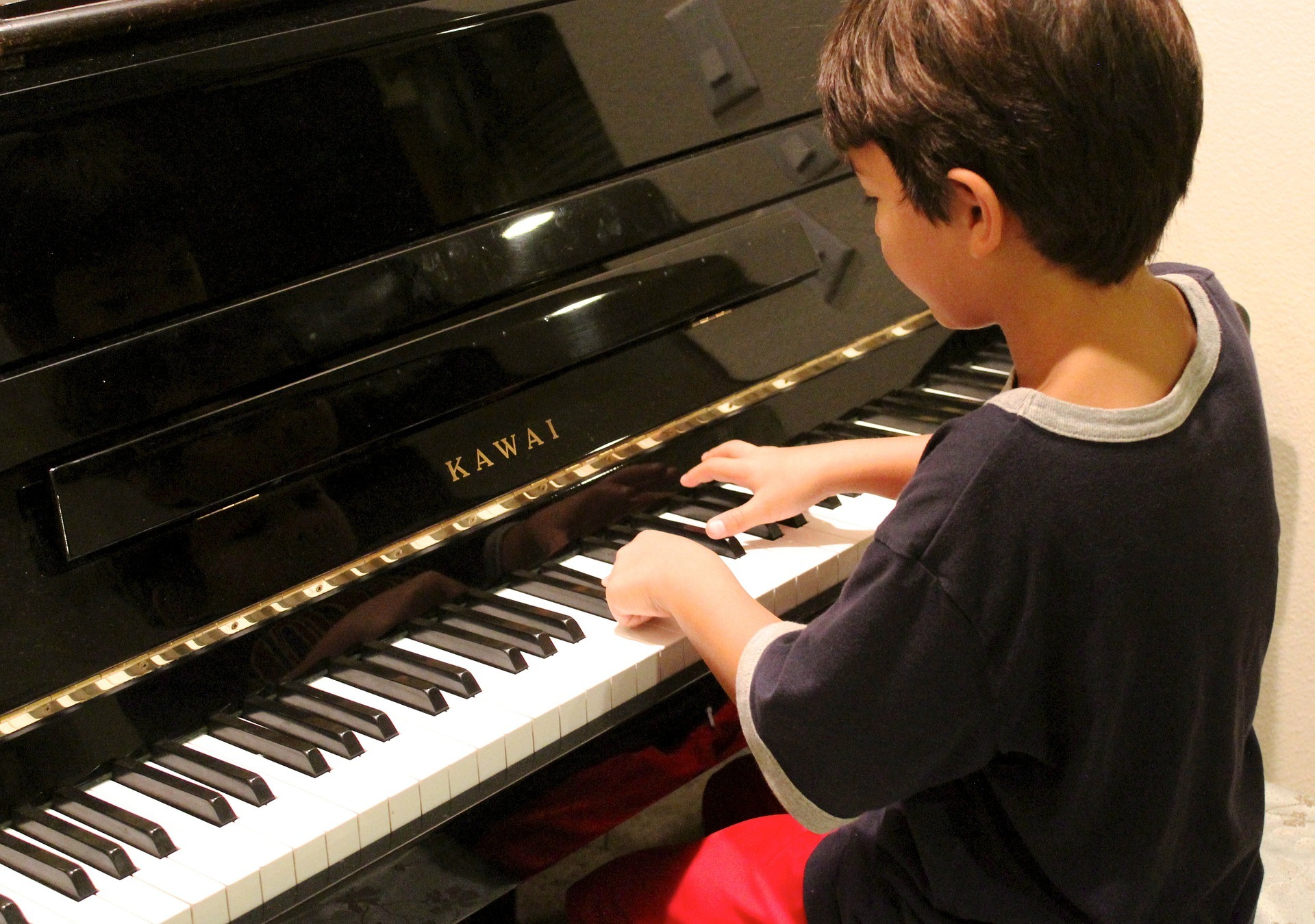 Young Boy playing piano
