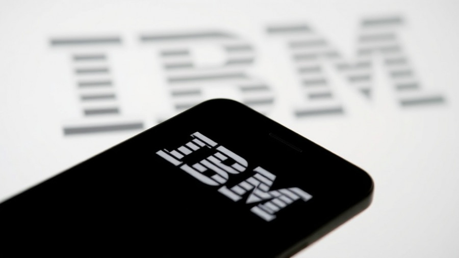 IBM logo displayed on smartphone screen with blurred background