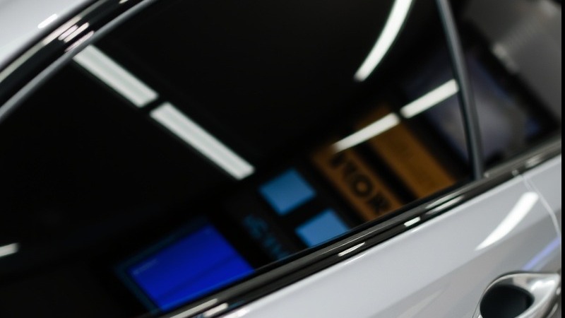 Car customization featuring stylish tinted glass for enhanced privacy.