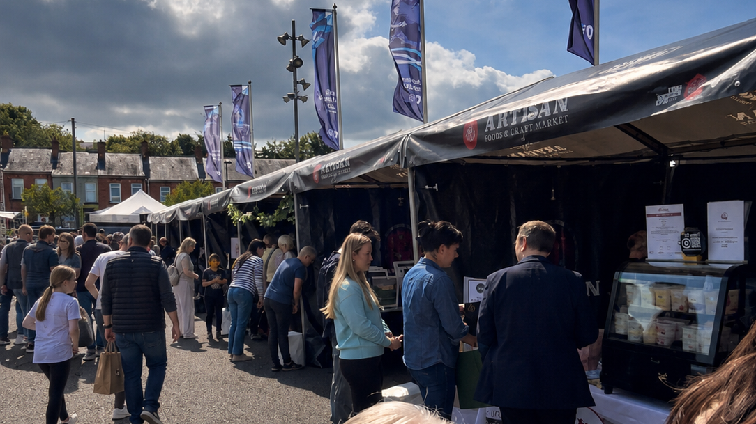 Stalls and shoppers at a local artisan market in Armagh