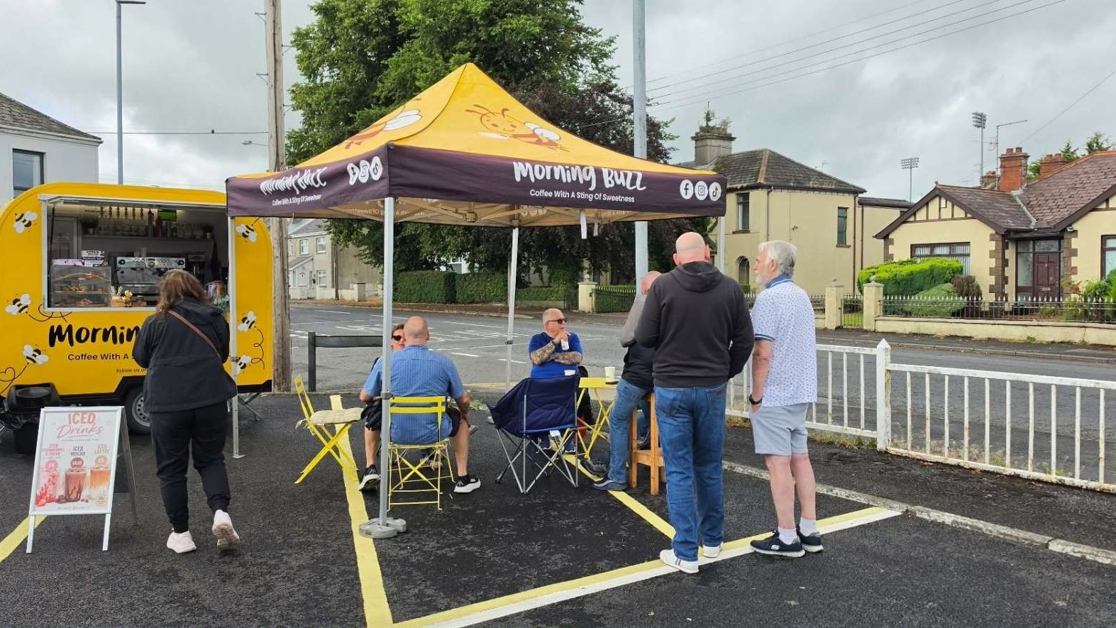 Customers at the Morning Buzz Coffee trailer and gazebo, Drop Inn car park, Armagh Road, Portadown