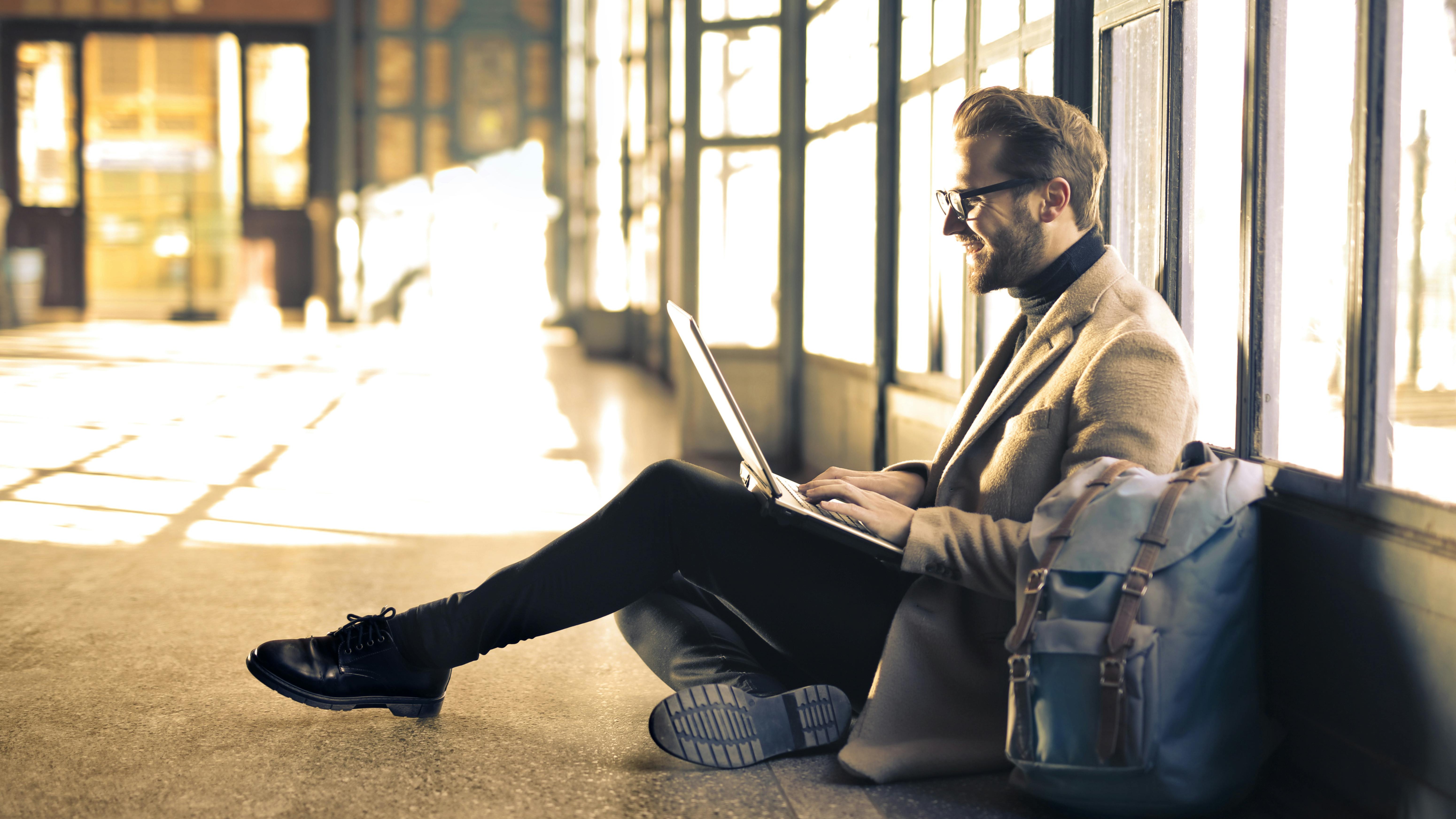 precise structuring plan, assessing expression, reviewing, photorealistic, open workspace with large projection screens, highly detailed, team members gathered around, sharp focus, neutral colors, daylight coming through the window, shot with a 50mm lens