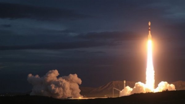 Dramatic rocket launch under overcast sky, SpaceX xAI merger implications.
