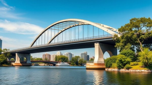 Modern arched bridge over river under clear sky, bridge loan for homebuyers concept.