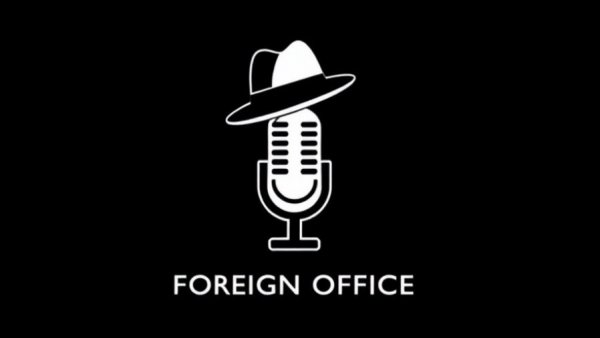 Minimalistic icon of hat and microphone, text 'FOREIGN OFFICE'.
