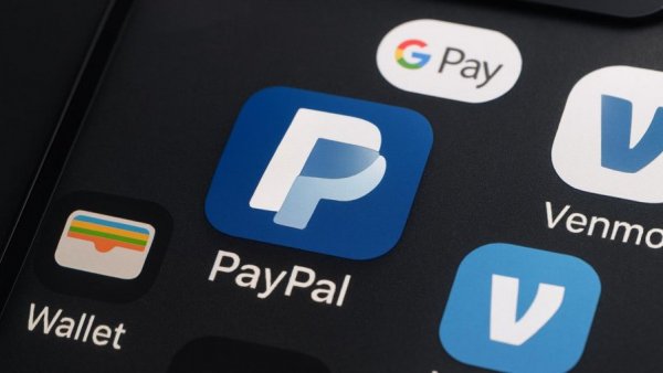 PayPal app icon on mobile screen, mobile payment options.