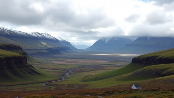 Green cliffs and snowy mountains on a family expedition in Iceland's highlands