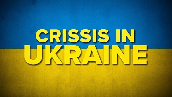Crisis in Ukraine headline, symbolic Ukraine flag background.