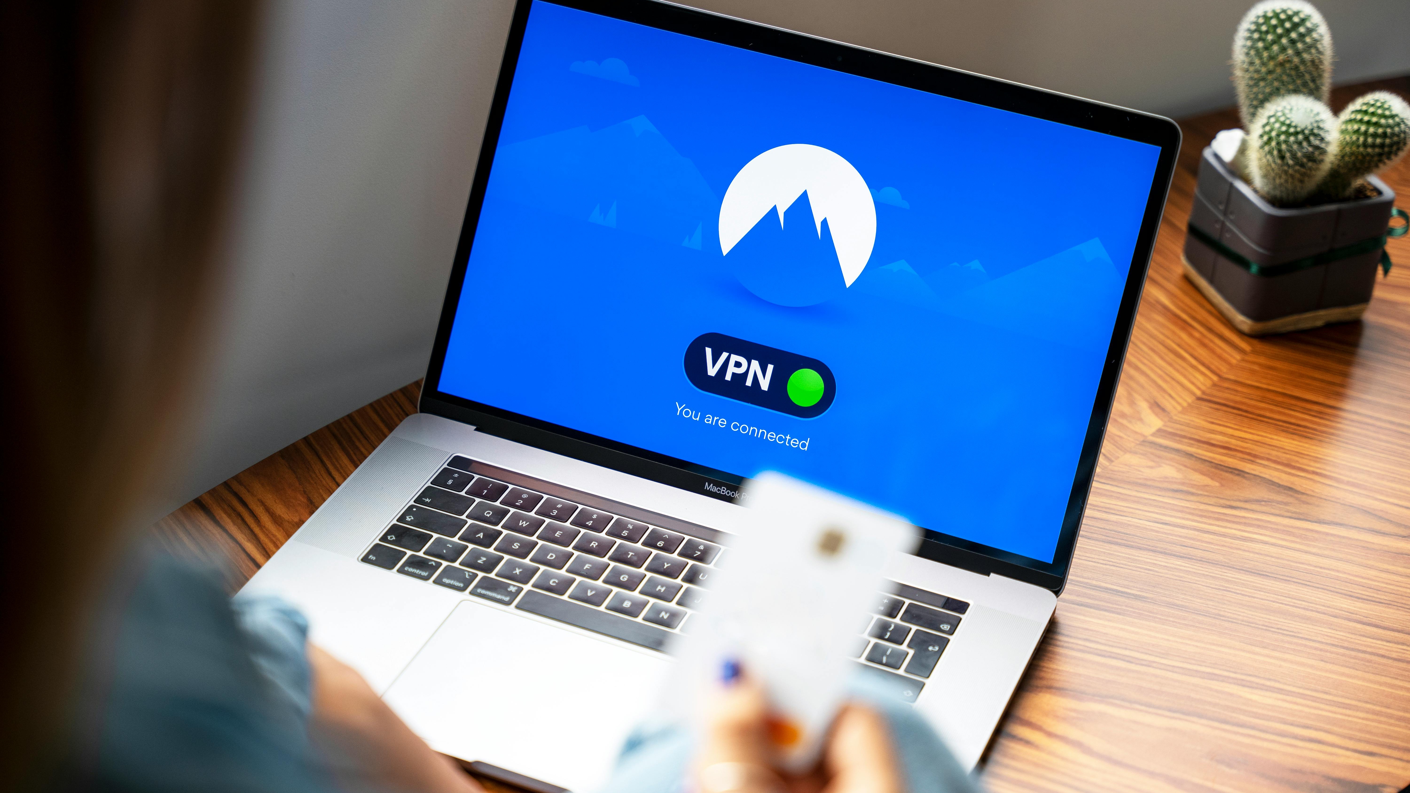 Focused gamer using VPN for online gaming in a digital environment.