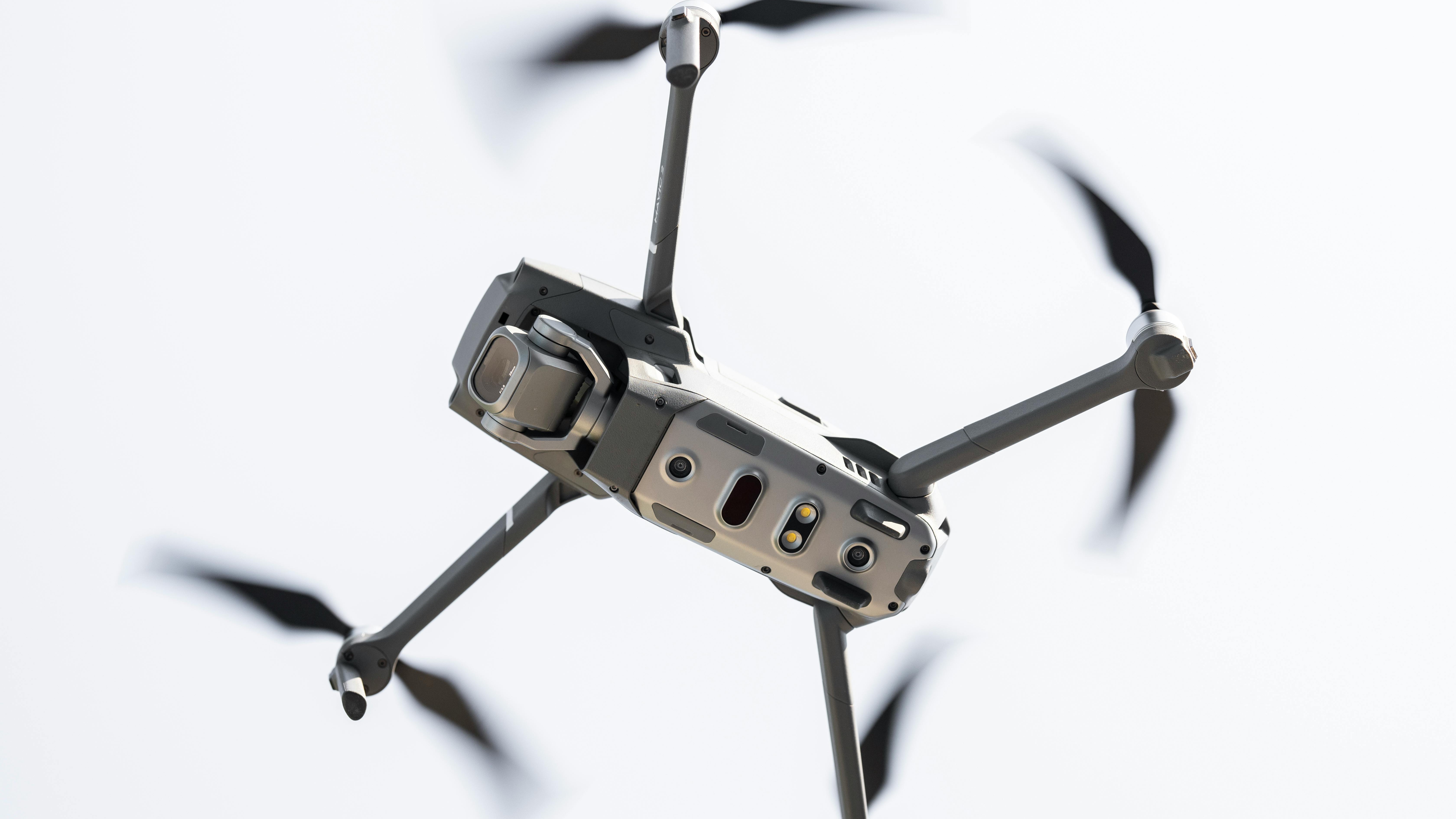 Advanced drone in mountainous setting, related to drones ban and military contracts