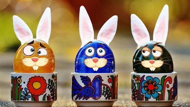 Colorful Easter eggs in grass, Omaha Easter celebrations.