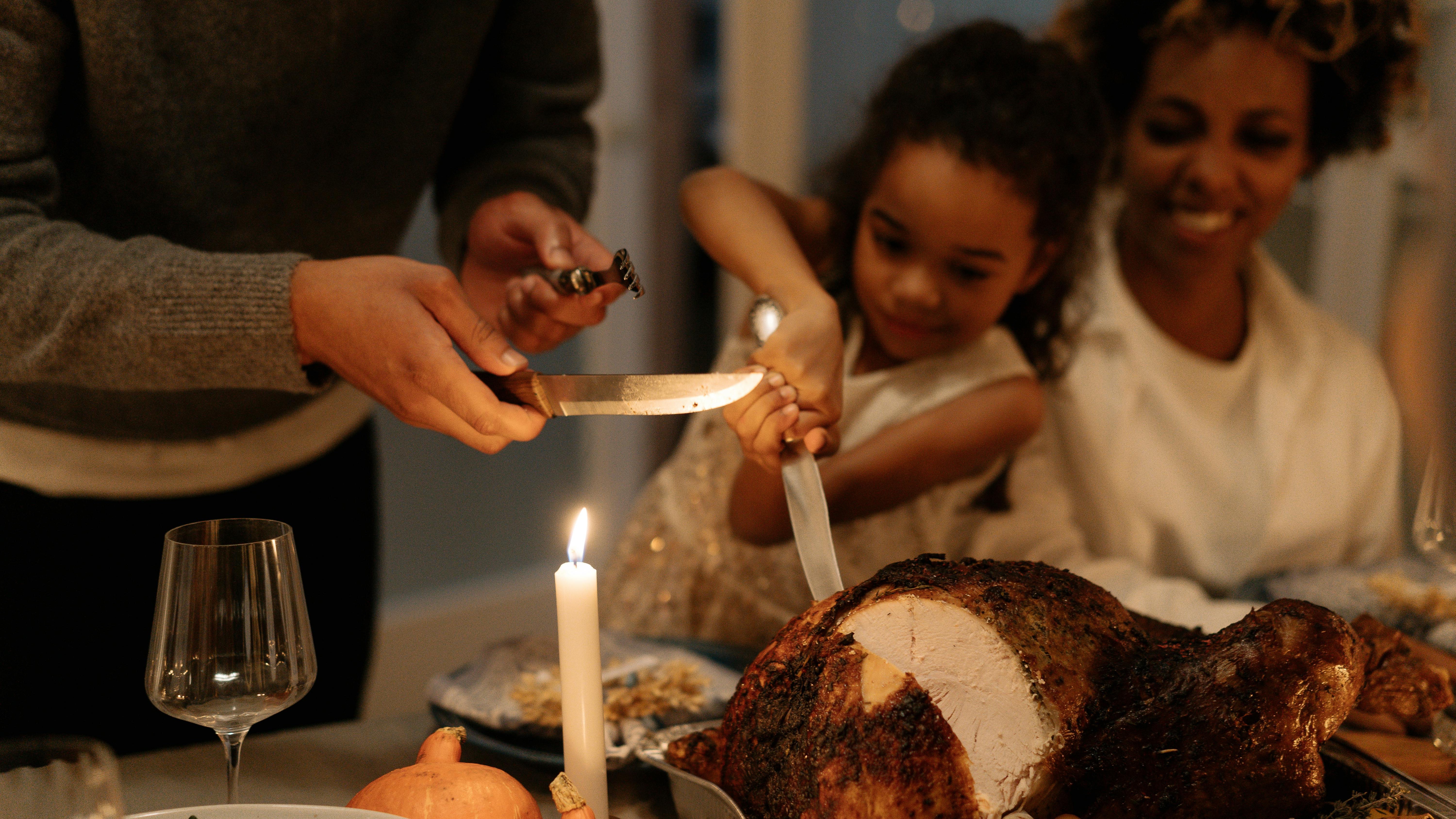 Thanksgiving card with cheerful turkey, pumpkins, and pie.