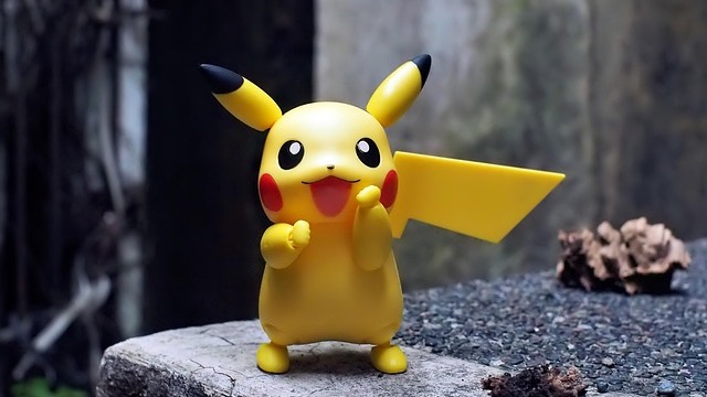 Nintendo Switch on Pokémon cards, showcasing gaming appeal in Japan.