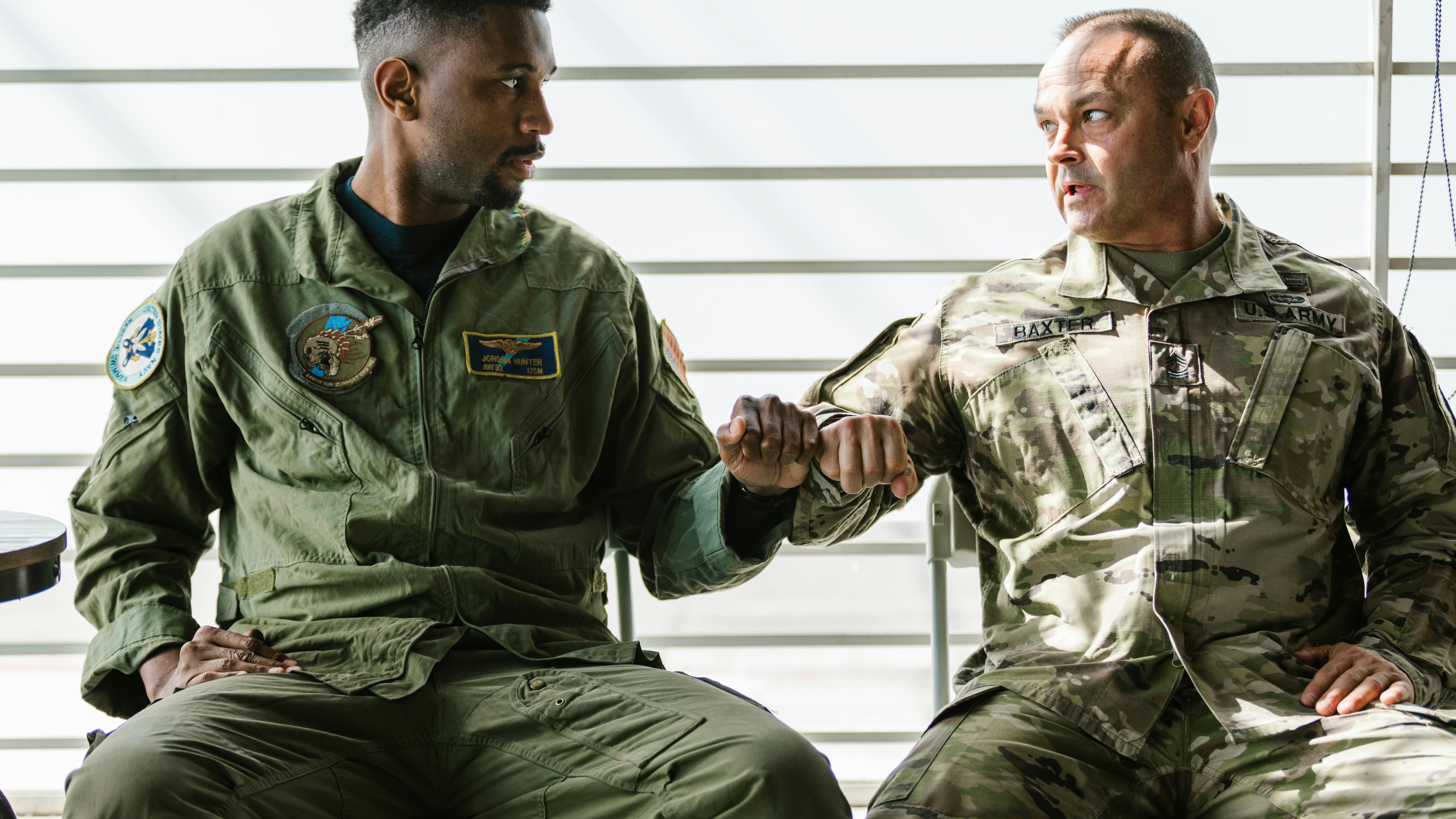 U.S. Special Operations Command emblem with paratroopers in cloudy sky highlighting military jobs.