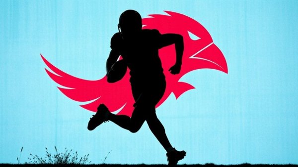 Dynamic silhouette football player running against blue backdrop.