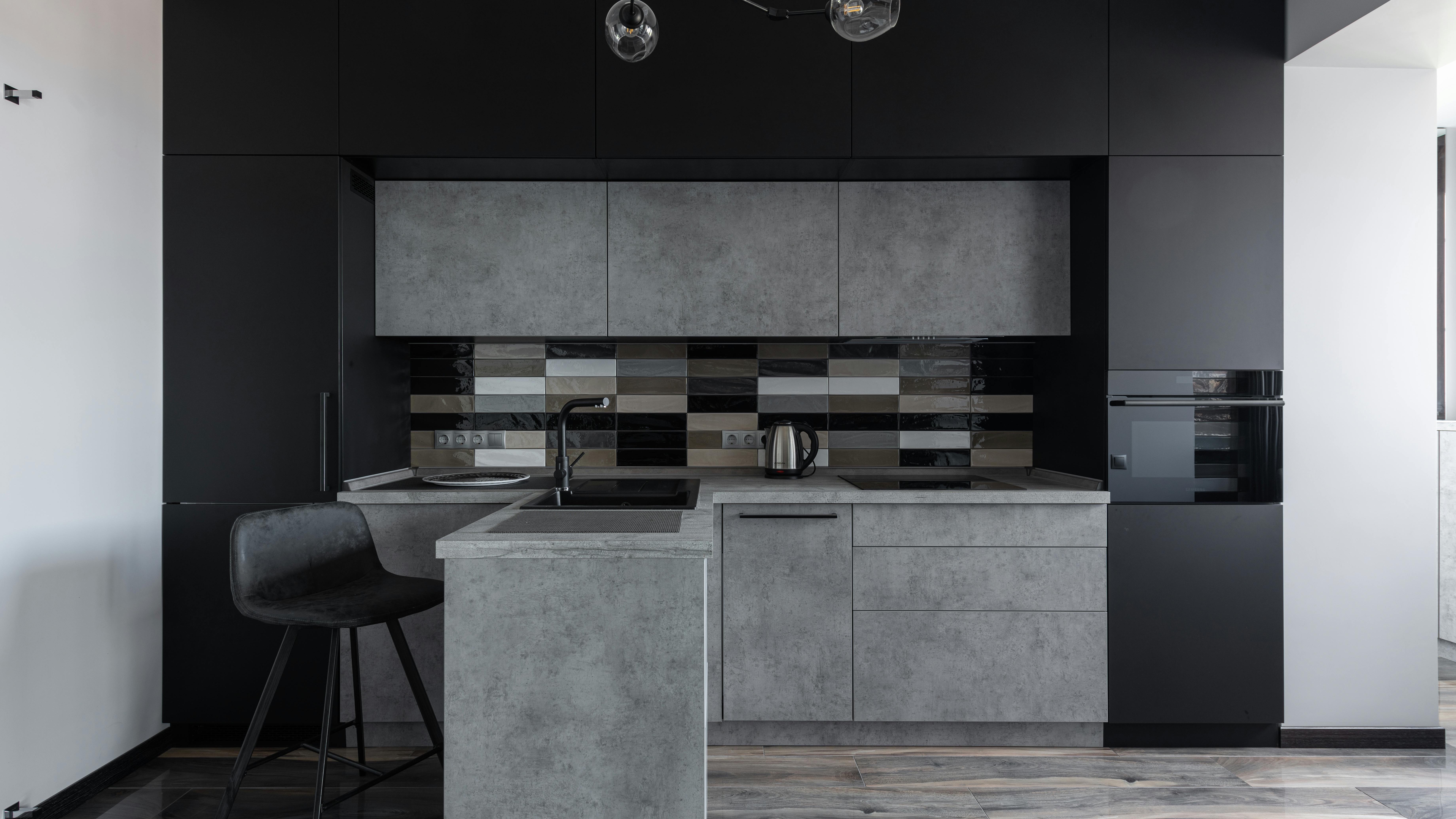 Open dishwasher with varied items inside, illustrating bathroom items you can clean in the dishwasher.