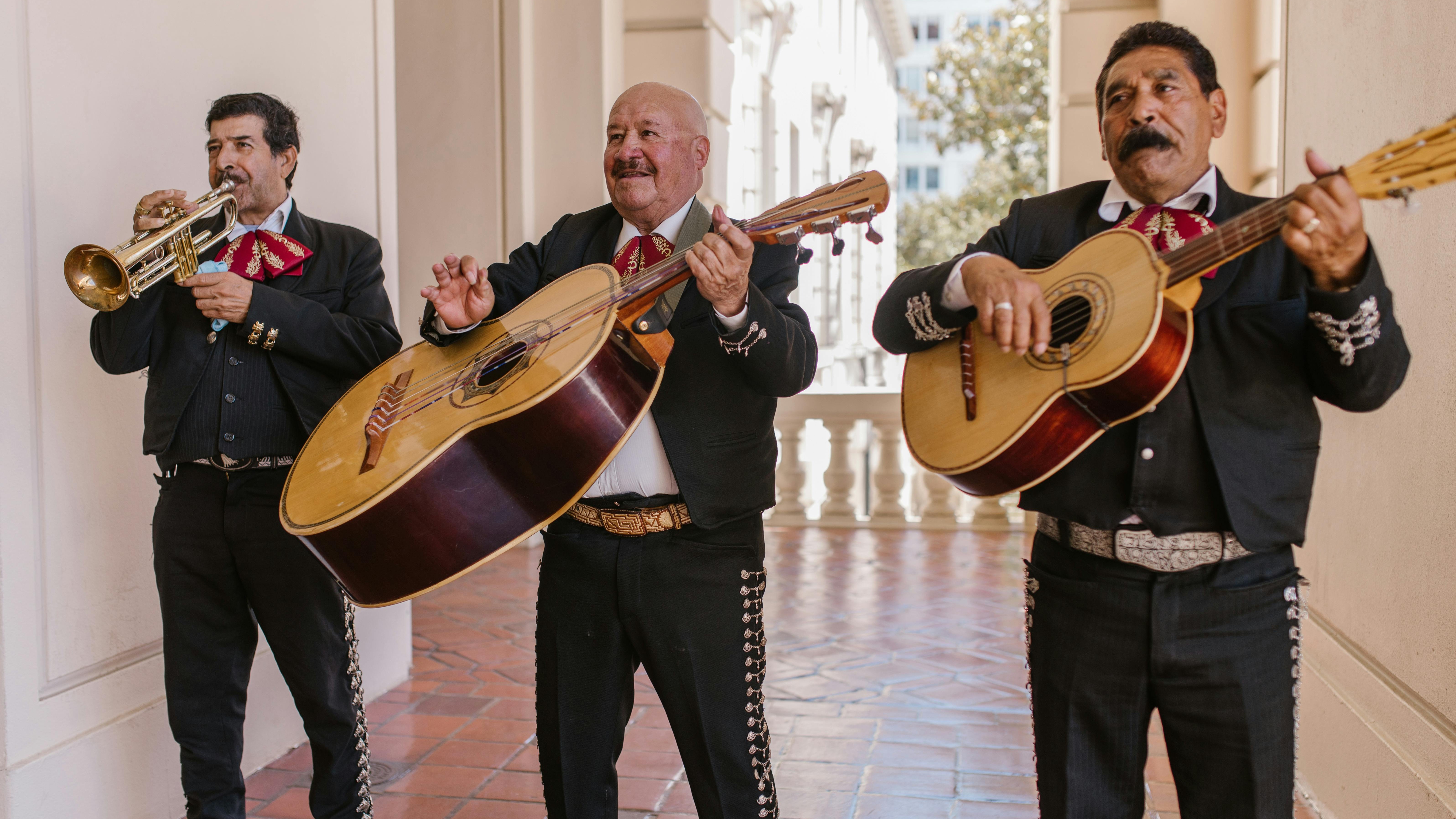 Mariachi band performing at Cinco de Mayo festival in Omaha street.