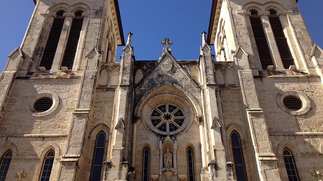 A retrospective banner for San Antonio community events with bold text on blue.
